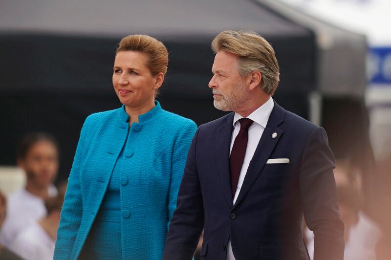 Danish Premier Mette Frederiksen and her husband Bo Tengberg arrive at the official international ceremony to mark the 80th anniversary of D-Day (Jordan Pettitt/AP)