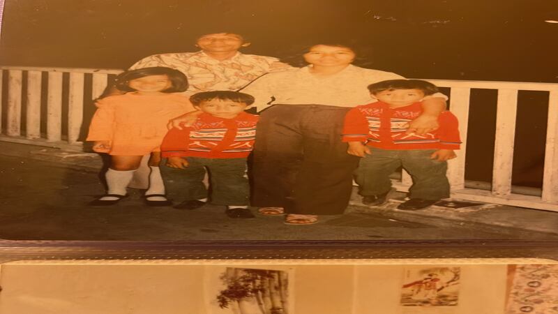 Yen Hoang Lam (left) with mother, father and younger twin brothers in Hong Kong (Yen Hoang Lam)