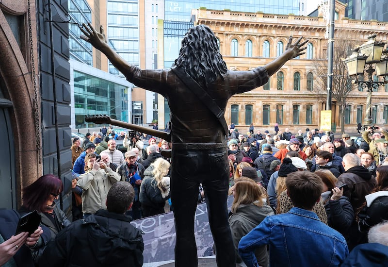 A commemorative statue of legendary composer and musician Rory Gallagher was revealed today at Ulster Hall, honouring his life, music, and his deep connection to Belfast. 
Crafted by renowned sculptors Anto Brennan, Jessica Checkley of Bronze Art Ireland, and David O’Brien of Bronze Art Ireland. It is inspired by a January 1972 Melody Maker magazine cover shot of Rory onstage at Ulster Hall. PICTURE: MAL MCCANN