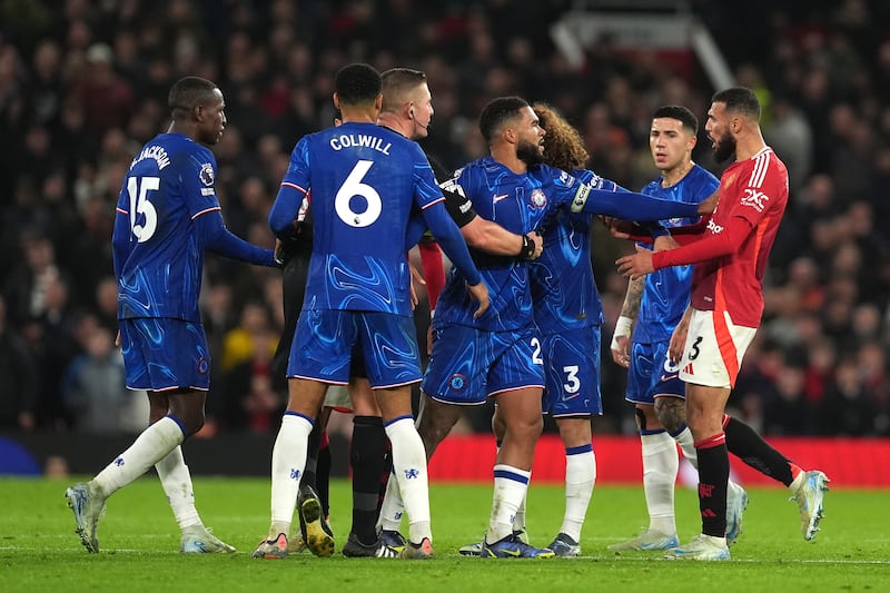 Noussair Mazraoui faces off with Chelsea’s players