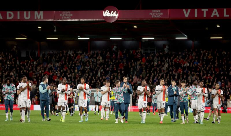 Luton and Bournemouth players anxiously awaited news of Tom Lockyer on Saturday