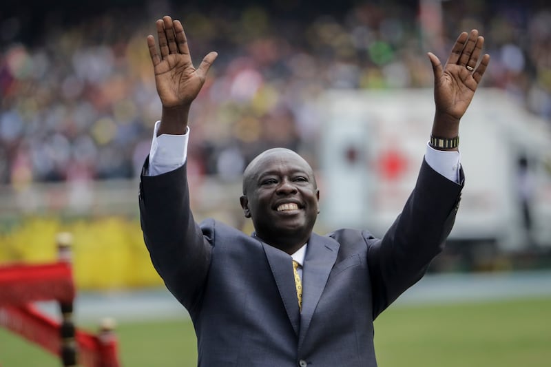 Kenya’s deputy president Rigathi Gachagua gestures to the crowd at the swearing-in ceremony for Kenya’s new president William Ruto (Brian Inganga/AP)