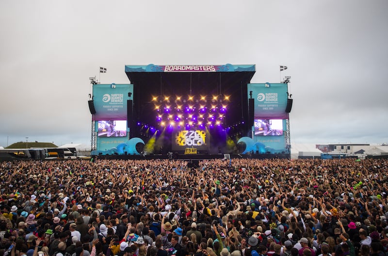 Festival attendees watching Dizzee Rascal during the Boardmasters music and surfing festival in 2021