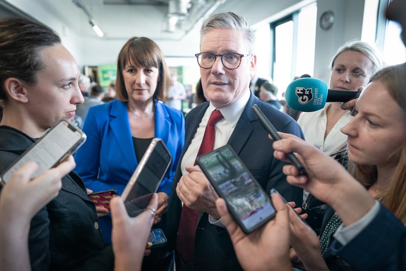 Labour Party leader Sir Keir Starmer and shadow chancellor Rachel Reeves face questions from journalists during a visit to Morrisons in Swindon