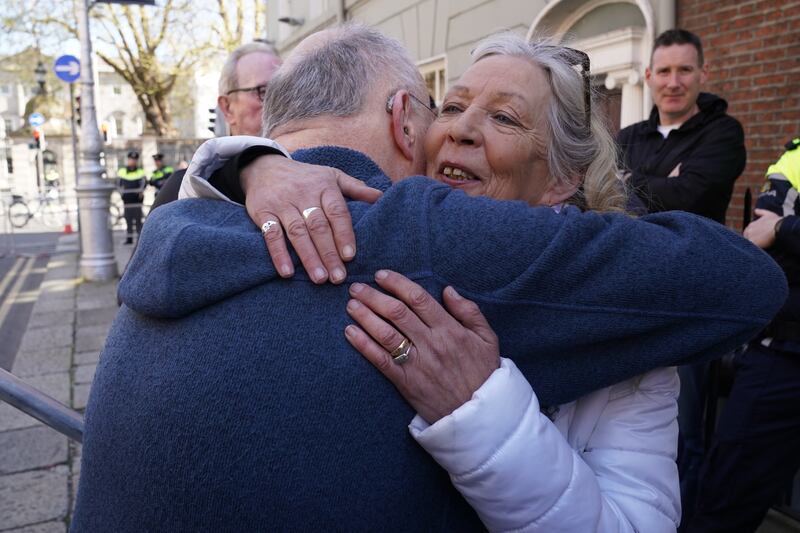 Stardust fire survivor Antoinette Keegan is embraced by Christy Moore after he performed at the national demonstration in support of Palestine