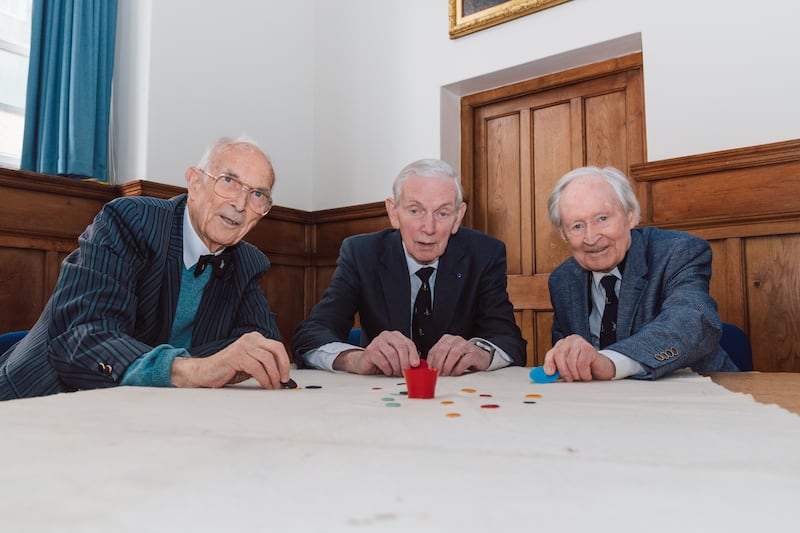 (L-R) Bill Steen, Peter Downes and Lawford Howells celebrate the 70th anniversary of competitive tiddlywinks.