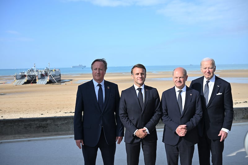 Foreign Secretary Lord David Cameron with French President Emmanuel Macron, German Chancellor Olaf Scholz and US President Joe Biden at the D-Day international ceremony (Abaca Press/Alamy Stock Photo)