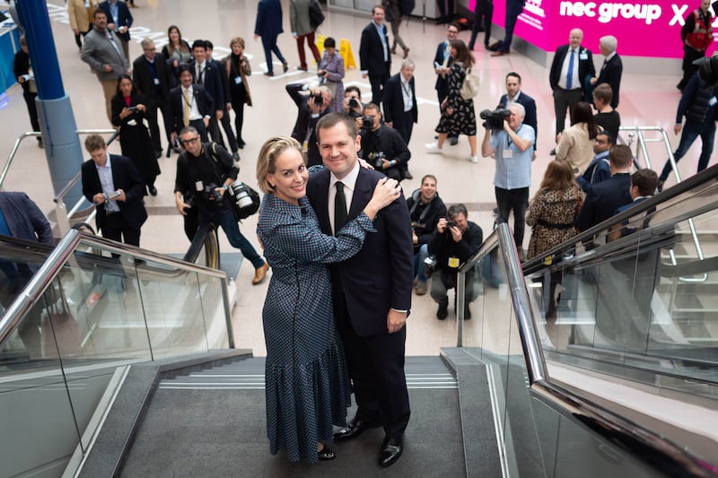 Robert Jenrick poses with his wife Michal Berkner at the Conservative Party Conference