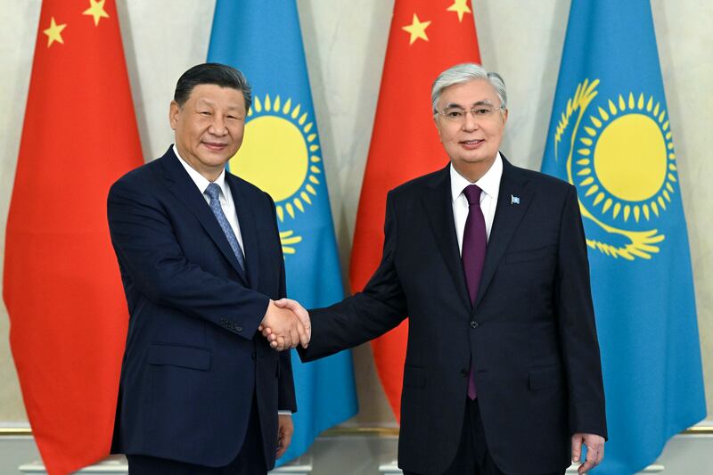 President Kassym-Jomart Tokayev of Kazakhstan, right, and Chinese President Xi Jinping meet in Astana (Kazakhstan’s Presidential Press Office via AP)
