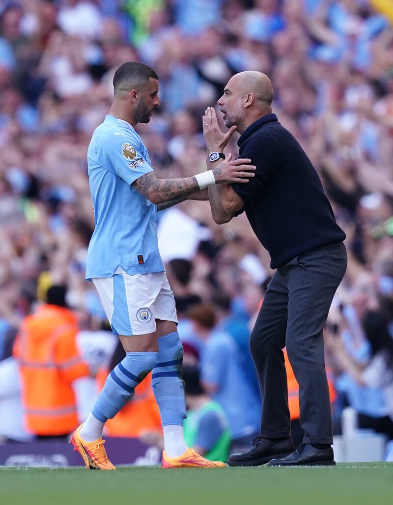 Guardiola (right) insists there will still be nerves