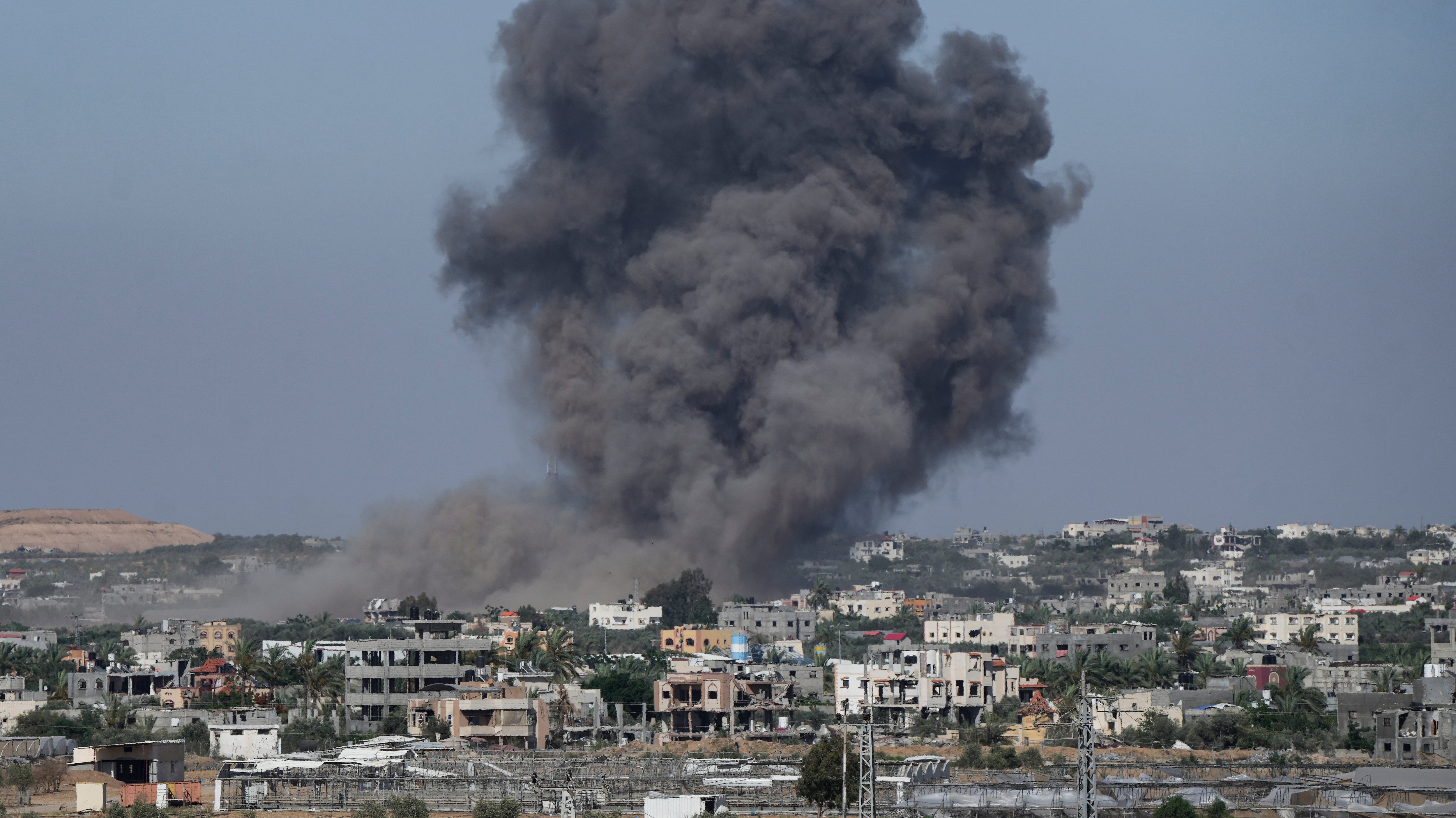 Smoke rises following an Israeli airstrike in Rafah in the southern Gaza Strip (Abdel Kareem Hana/AP)