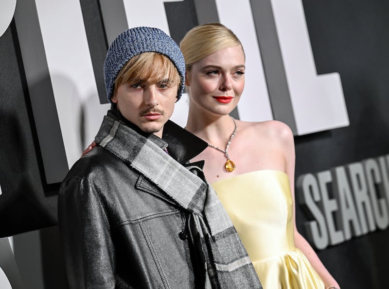 Timothee Chalamet, left, and Elle Fanning attend the premiere of A Complete Unknown (Evan Agostini/Invision/AP)