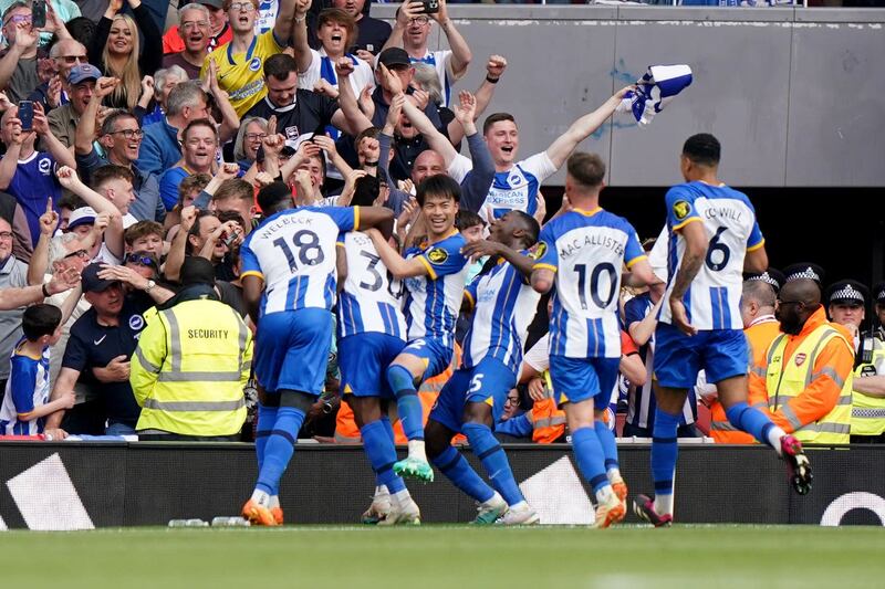 Brighton's Pervis Estupinan celebrates the final goal at Arsenal