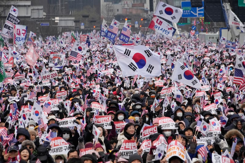 Supporters for impeached South Korean President Yoon Suk Yeol stage a rally against his impeachment in Seoul (AP Photo/Ahn Young-joon)