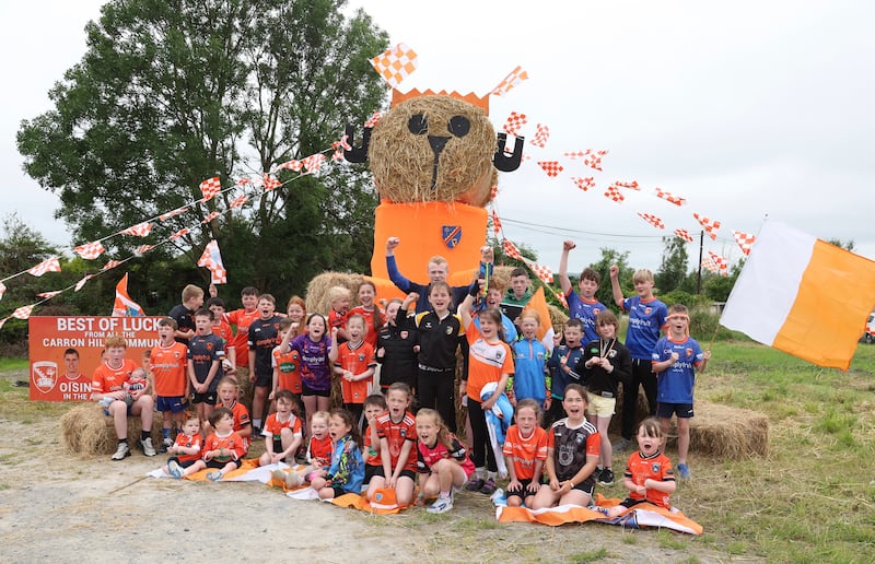 Children  with Sam the Teddy bear built by as The Carron Hill  Community near Crossmaglen.
PICTURE COLM LENAGHAN