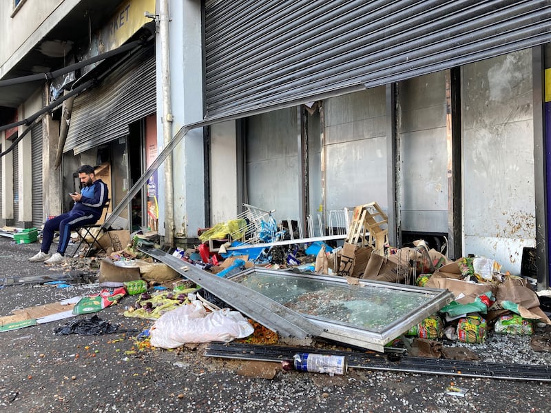 Abdelkader Mohamad Al Alloush, owner of the Sham Supermarket on Donegall Road in Belfast, after his shop was burned during disorder in the area following an anti-immigration protest on Saturday