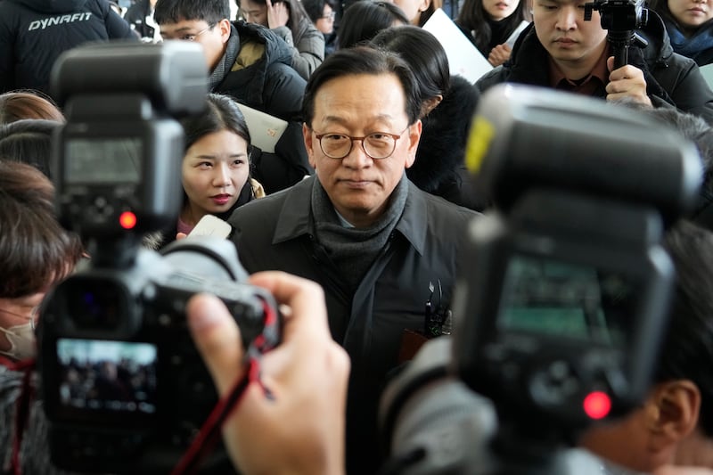 Seok Dong-hyeon, centre, a lawyer and spokesperson for South Korea’s impeached President Yoon Suk Yeol (Ahn Young-joon/AP)