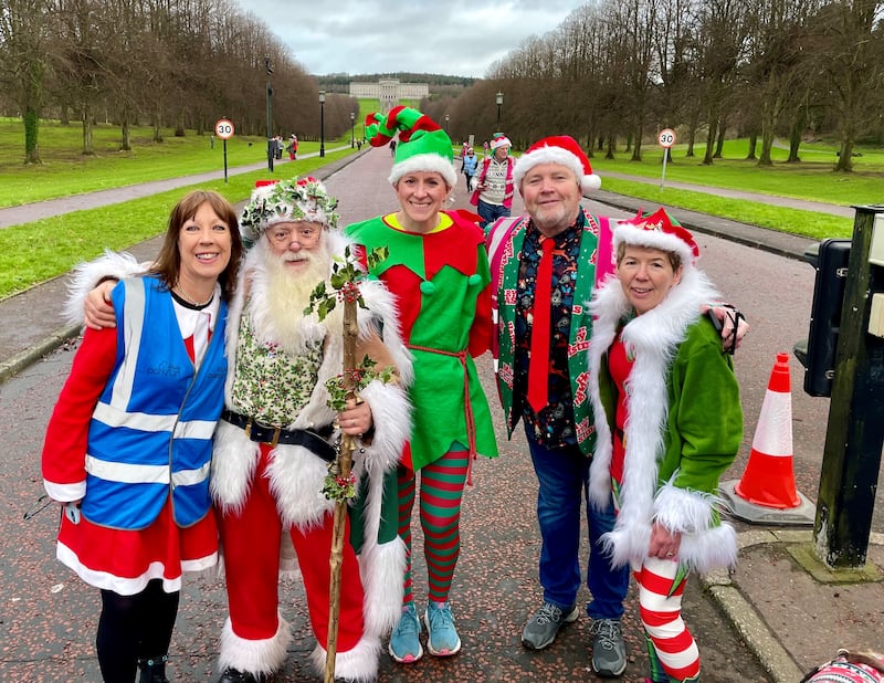 (left to right) Stormont Parkrun race director Marianne Hood, Jimmy McNeilly as Father Christmas, event director Alison Canning, Gary Craig and Una McNeill