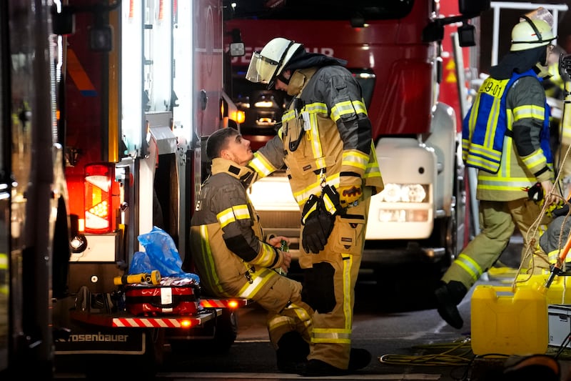 Emergency services work in a cordoned-off area near a Christmas Market, after a car drove into a crowd in Magdeburg, Germany, on Friday (Ebrahim Noroozi/AP)