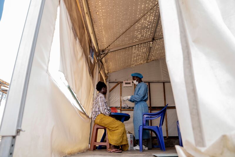 A health worker attends to an mpox patient, at a treatment centre in Munigi (Moses Sawasawa/AP)