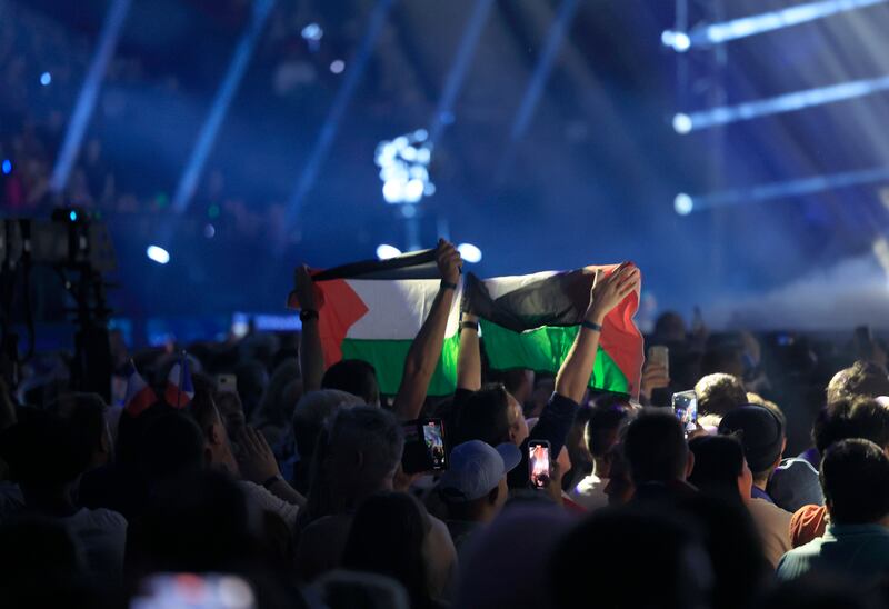 Palestinian flags held up in the crowd (Andreas Hillergren/AP)