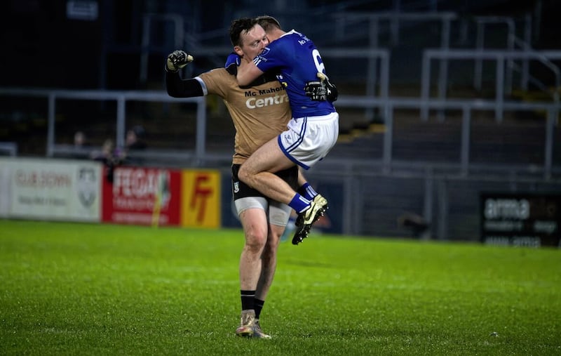 Scotstown goalkeeper Rory Beggan celebrates with team-mate Donal Morgan 