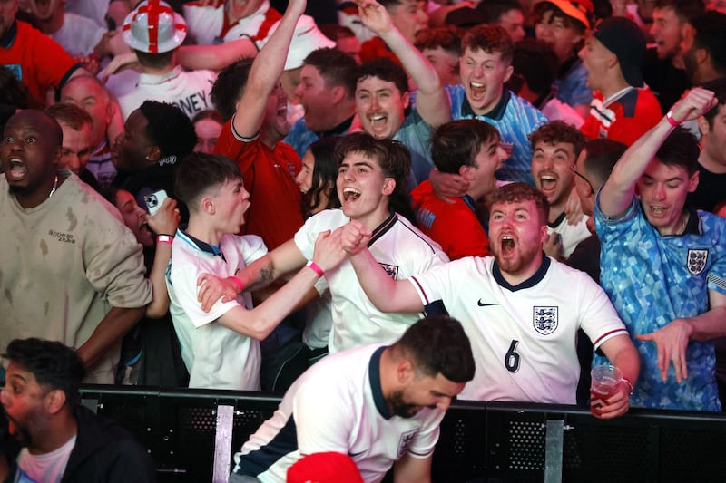 England fans celebrate the winner at BOXPark Wembley