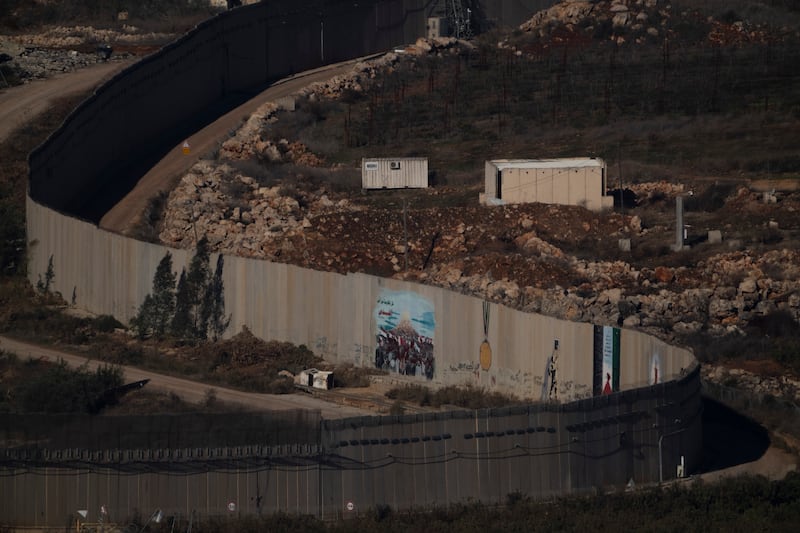 A wall marks the Israeli-Lebanese border (Leo Correa/AP)