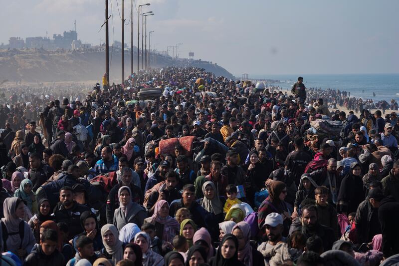 A surge in humanitarian aid into Gaza continued under the ceasefire as thousands return to the region (Abdel Kareem Hana/AP)