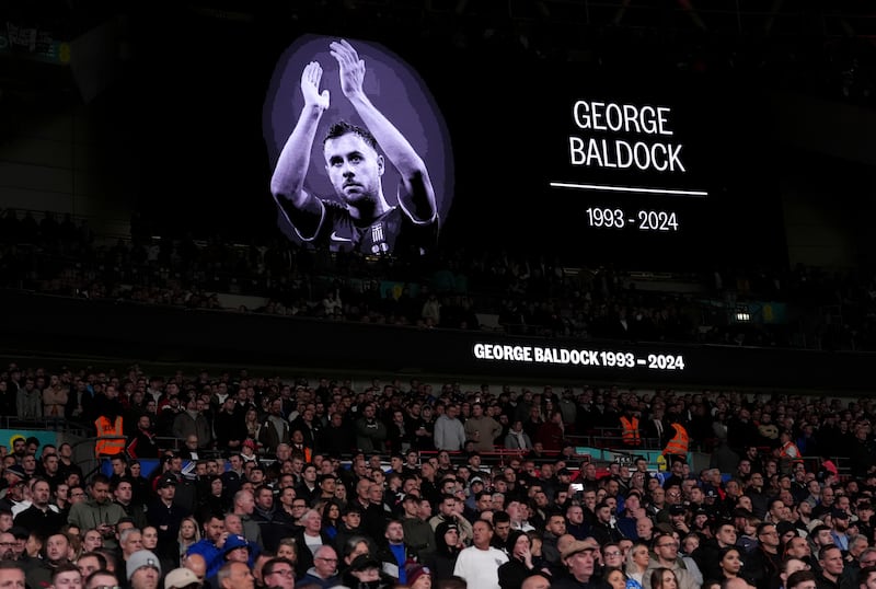 A tribute to George Baldock on the big screen at Wembley