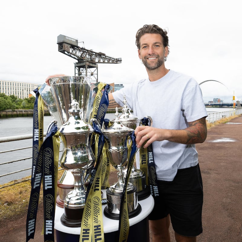 Charlie Mulgrew with the William Hill SPFL trophies (handout)
