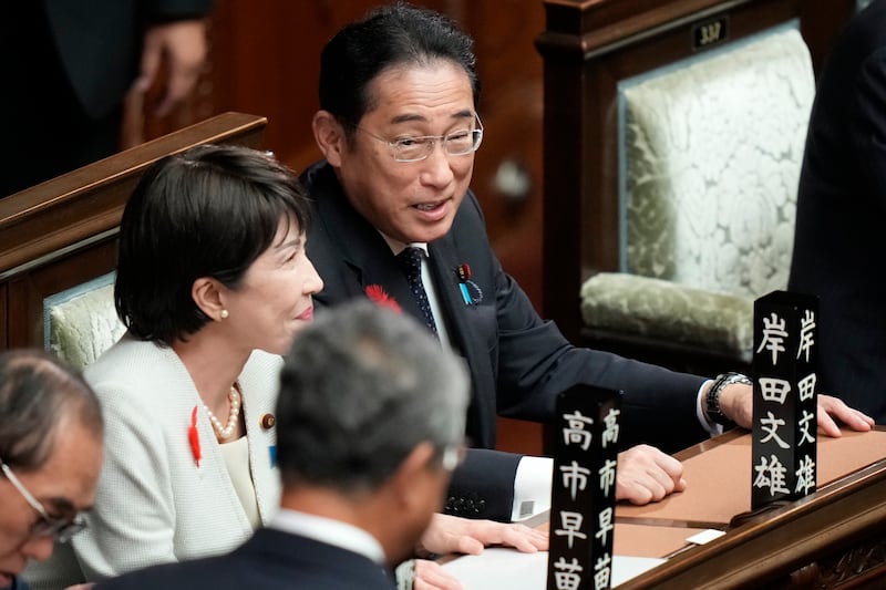 Outgoing prime minister Fumio Kishida, right, announced in August that he would resign at the end of his three-year term (Eugene Hoshiko/AP)