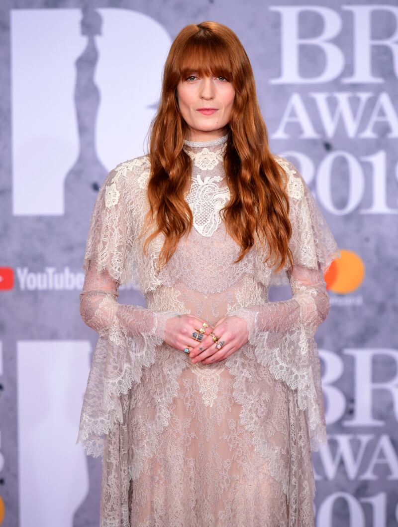 Florence Welch in a layered lace ensemble at the Brit Awards