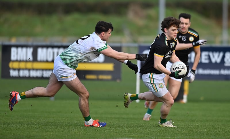 Dalaigh Jones of Dungannon in action against Michael McCallan of Carrickmore in the Tyrone League final at Augher. Picture Oliver McVeigh