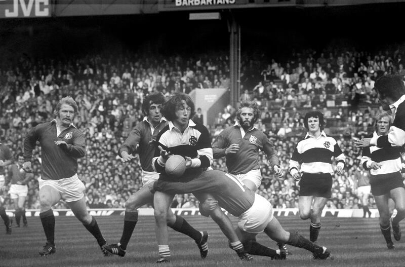 Lions wing Peter Squires tackles the Barbarians’ JPR Williams in the 1977 Silver Jubilee match at Twickenham