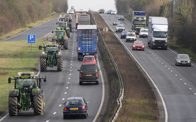 Farmers in tractors making their way along the A303 near Andover, Hampshire during a national rally organised by Farmers To Action earlier in January