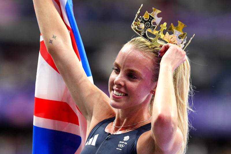 Keely Hodgkinson donned a gold crown during her victory lap