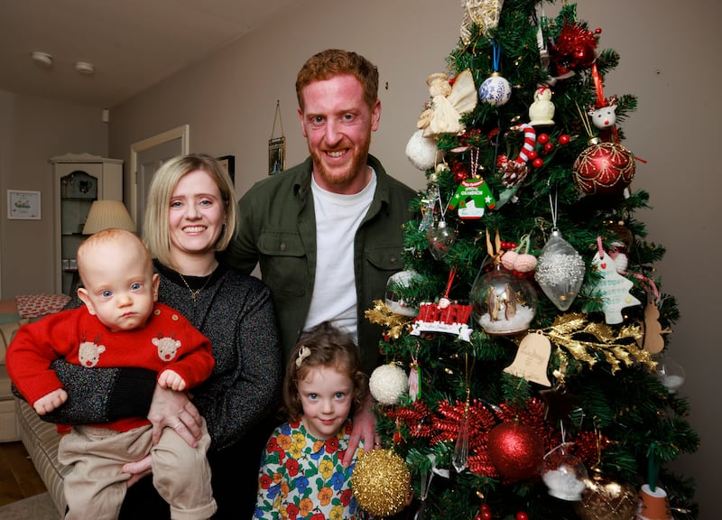 Matthew and Lindsay Ace with their four-year-old daughter Aine and 14-month-old son Iarla at their family home in Castlecaulfield near Dungannon, Co Tyrone. PA Photo. Picture date: Monday December 17 2024. See PA story ULSTER Baby. Photo credit should read: Liam McBurney/PA Wire