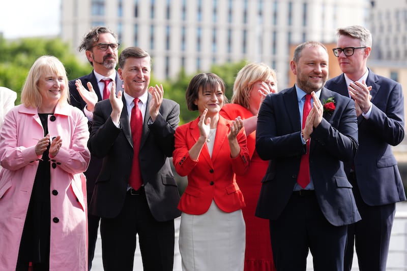 Douglas Alexander (third left) and Ian Murray (second right) were sworn in