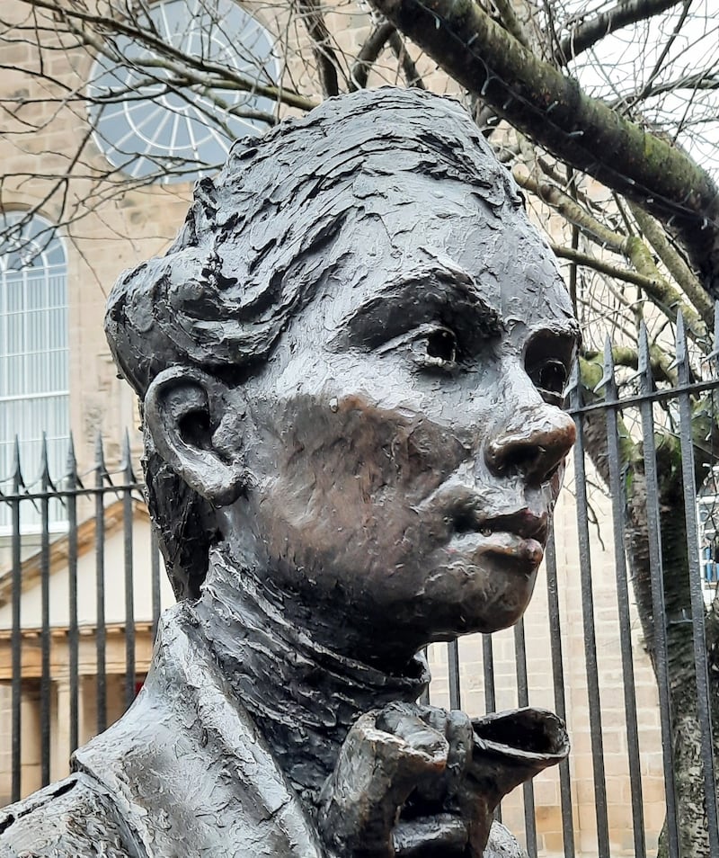 Robert Fergusson sculpture, Canongate, Edinburgh, by David Annand .