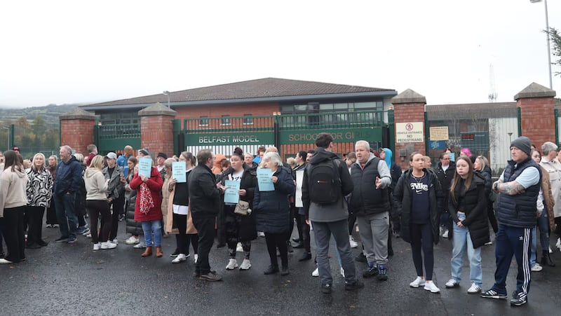 Protesters gathered last month at the gates of Belfast Model School for Girls in north Belfast. PICTURE: COLM LENAGHAN