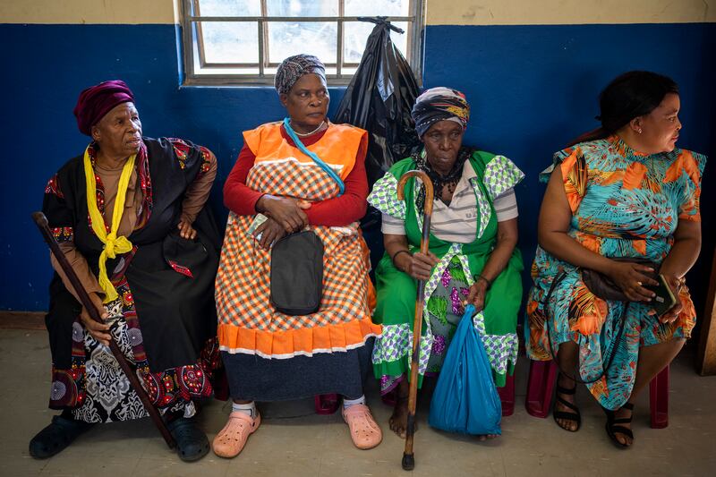Women wait to cast their ballots during general elections in Nkandla, Kwazulu Natal, South Africa (Emilio Morenatti/AP)