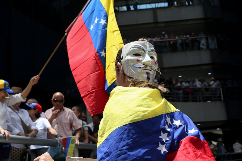 Opposition supporters protest the re-election of President Nicolas Maduro in Venezuela (Cristian Hernandez/AP)