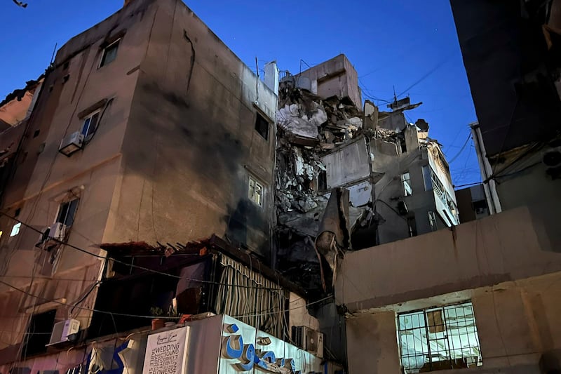 A damaged building that was hit by an Israeli airstrike in the southern suburbs of Beirut, Lebanon (Hussein Malla/AP)