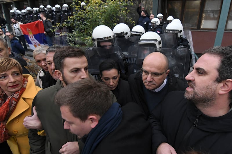 Opposition protesters are demanding arrests over a deadly roof collapse at a railway station in Novi Sad (AP)