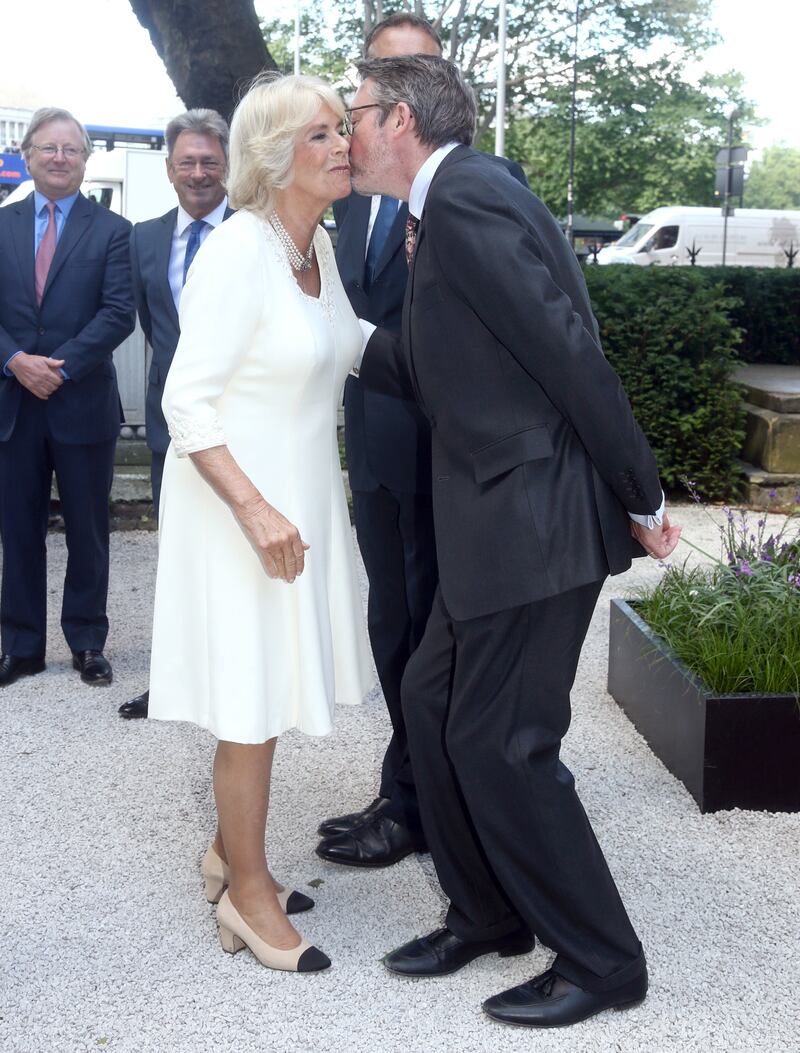 Camilla is greeted by florist Shane Connolly during a visit to London’s Garden Museum