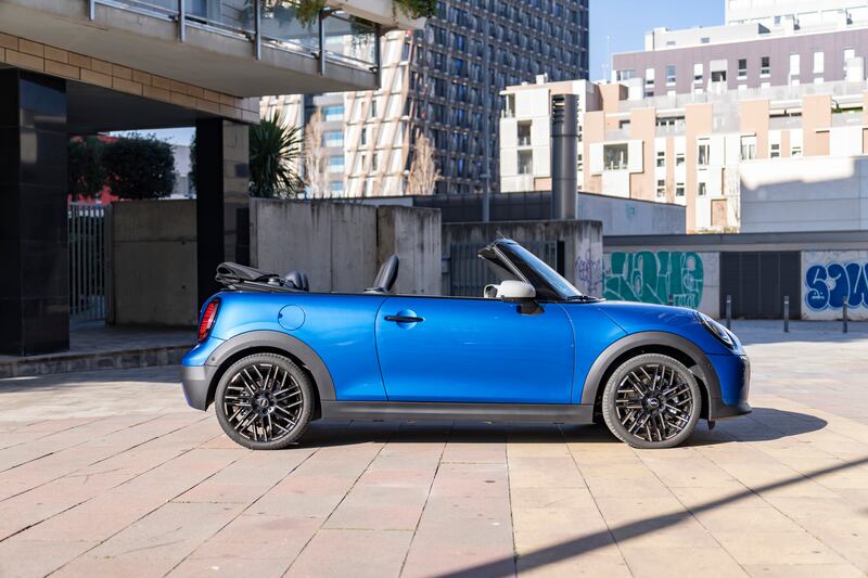 Its exterior design features the same Union Jack-styled tail lights and hexagonal front grille. (Mini)