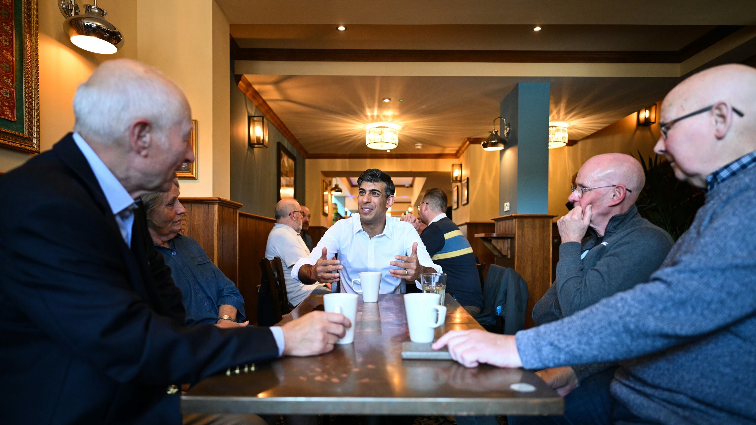 Prime Minister Rishi Sunak in his constituency in Northallerton meets veterans (clockwise from l to r) Douglas and wife Vicky Rudd, Mike Crisp and Michael Lloyd