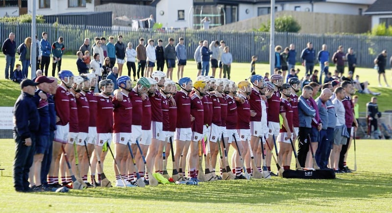 Cushendall hold a minute&#39;s silence in memory of the late John McKillop before their Bathshack Antrim Senior Hurling Championship Group Two game with Ballycastle Picture: Philip Walsh 