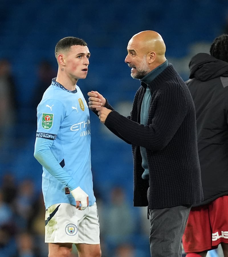 Guardiola (right) hopes Foden (left) can get back to his best